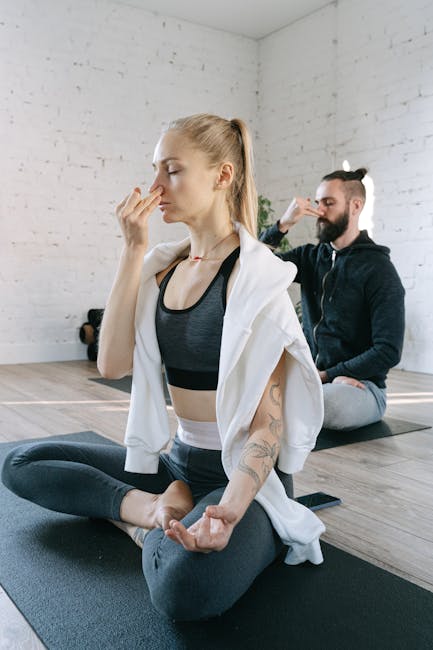 Woman meditating peacefully with eyes closed in a serene and sunlit room